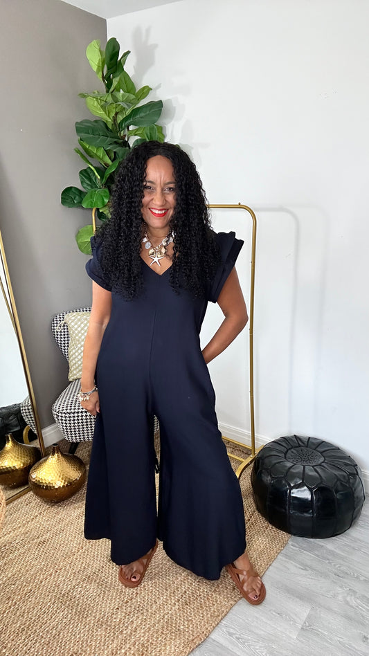 SALE JUMPSUIT WITH EXAGGERATED FRILL SLEEVE NAVY